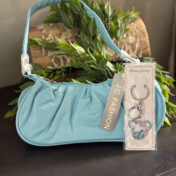 Source Unknown Handbags - NEW light blue small shoulder bag with mini bag charm to match  9.5”x4.5”